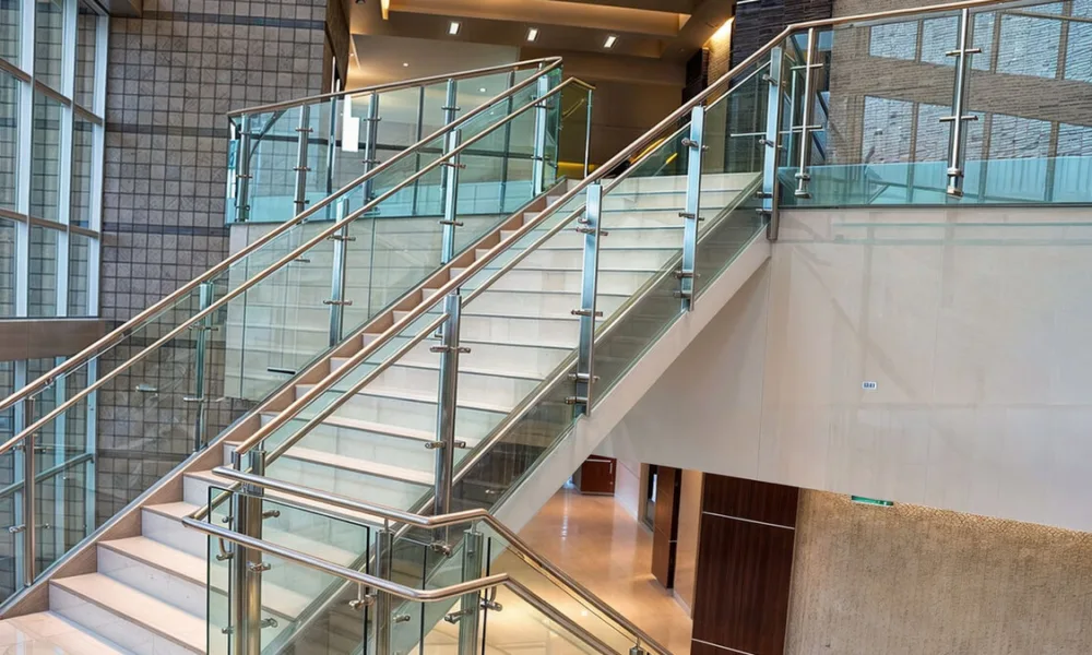 Handrail requirements often depend on factors such as riser count, stair width, open-sided exposure, and the type of project involved.