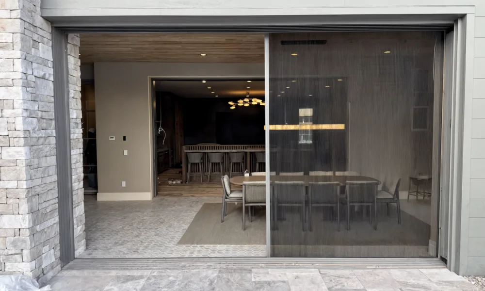 Front doors with privacy glass can reduce street-level visibility while preserving daylight in the entry area