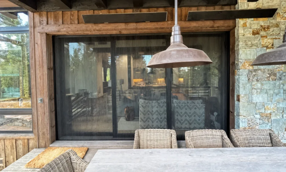 Electric privacy glass is most useful when an entrance needs to stay open and visible at times, but private during specific moments