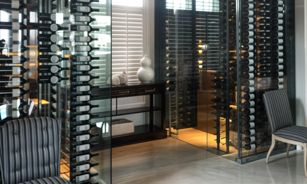 A home wine cellar can be integrated into dining rooms, stair areas, kitchens or entertainment spaces when layout, access, lighting and storage needs are planned together.