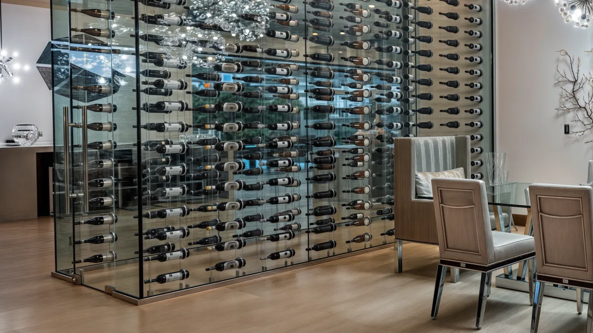 Small home wine cellars work best when bottle capacity, rack orientation, visibility and surrounding materials are considered before the space is built.