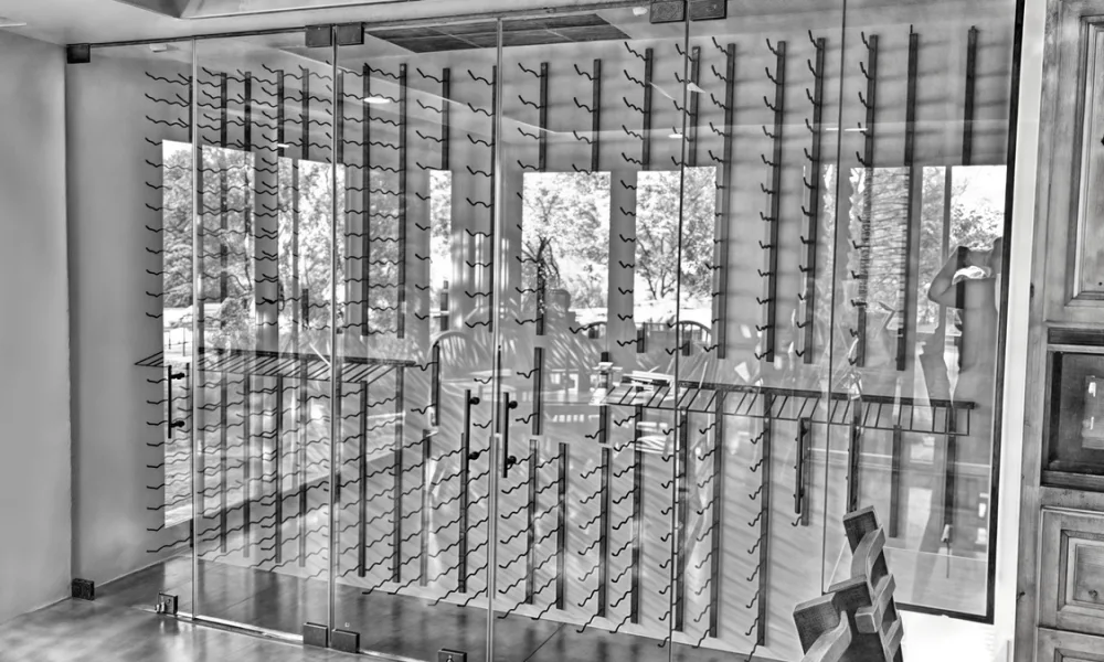 Wine cellar cost is shaped by project scope, including size, location, bottle capacity, enclosure type, racks, lighting, doors and installation conditions.