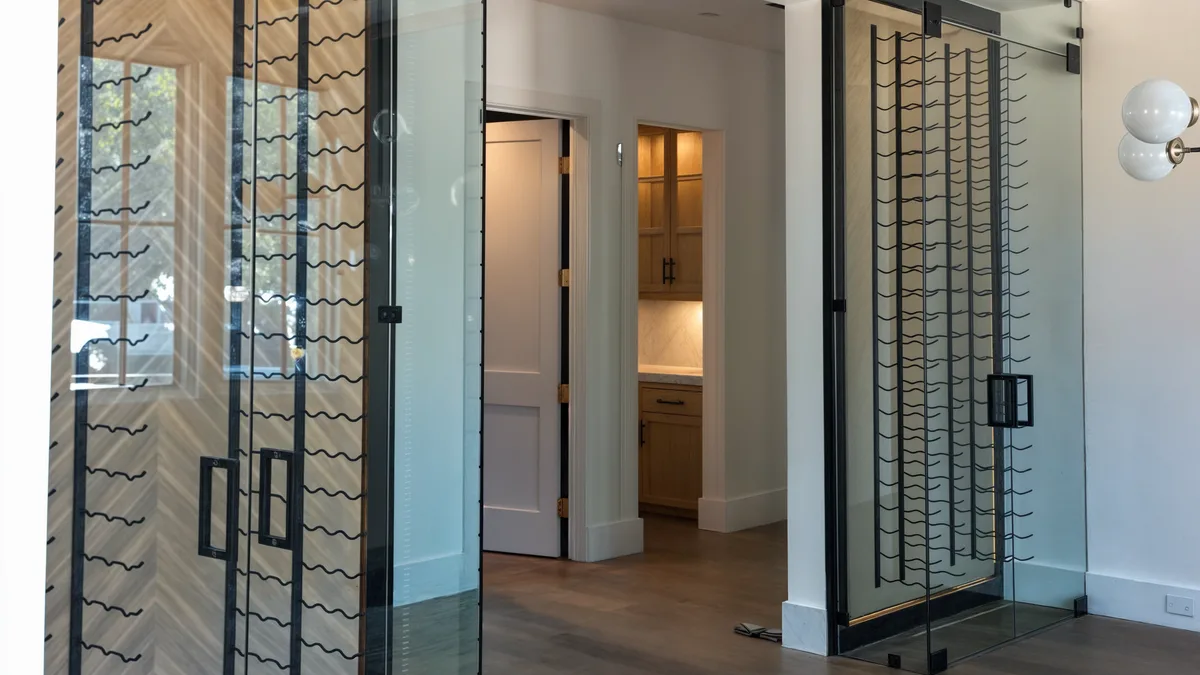 Before requesting a quote, defining dimensions, storage goals, visibility, rack preferences and climate-control needs can help clarify the wine cellar budget