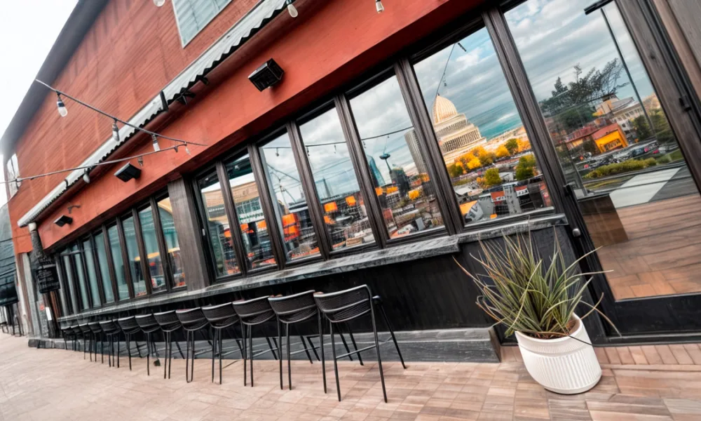 Sliding and folding glass doors leave different amounts of clear passage and require different areas for panel storage.